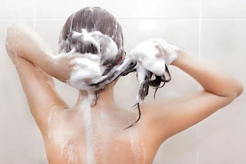Woman Shampooing Hair
