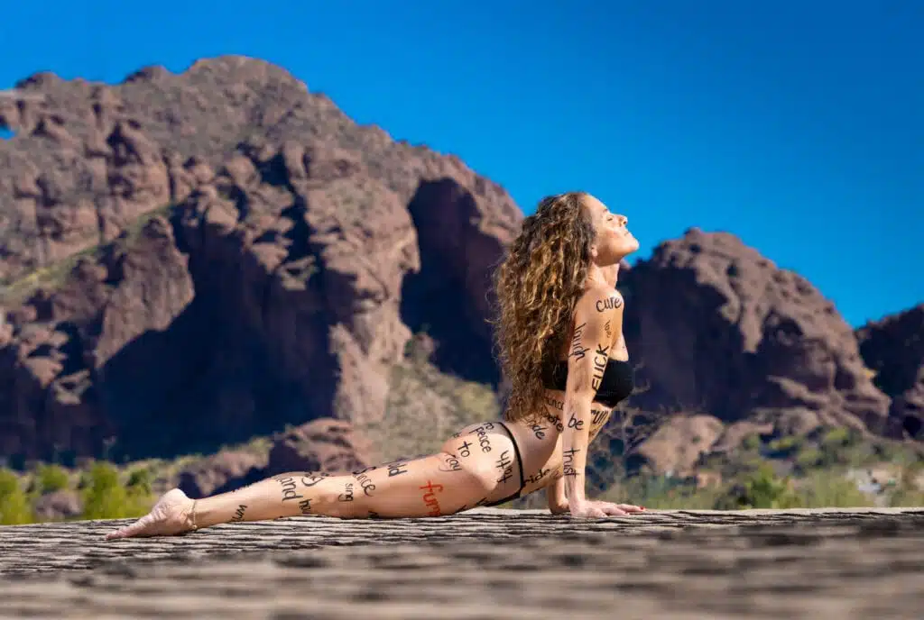 Julie Blew in a wellness yoga pose