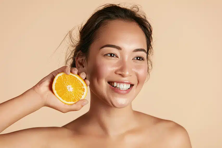 Woman trying vitamin c products