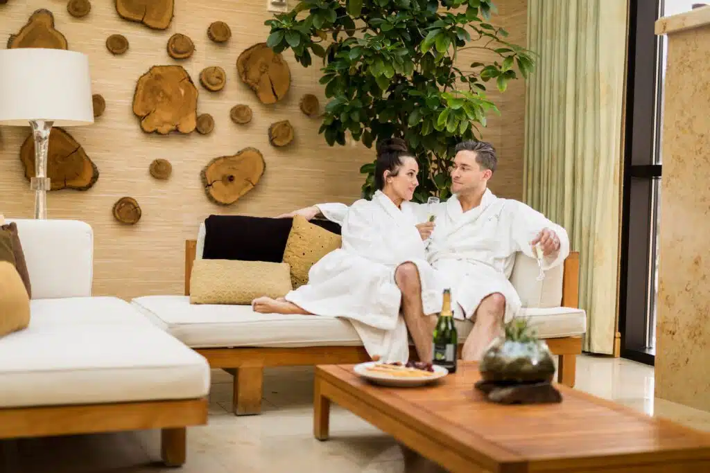 A couple enjoys champagne at The Spa at Coeur d'Alene