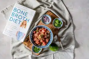poke bowl and Dr. Kellyann's Bone Broth Diet book
