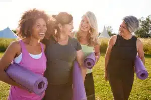 A group of four female friends after yoga outside