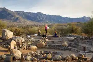 People meditating at Miraval with sound bowls