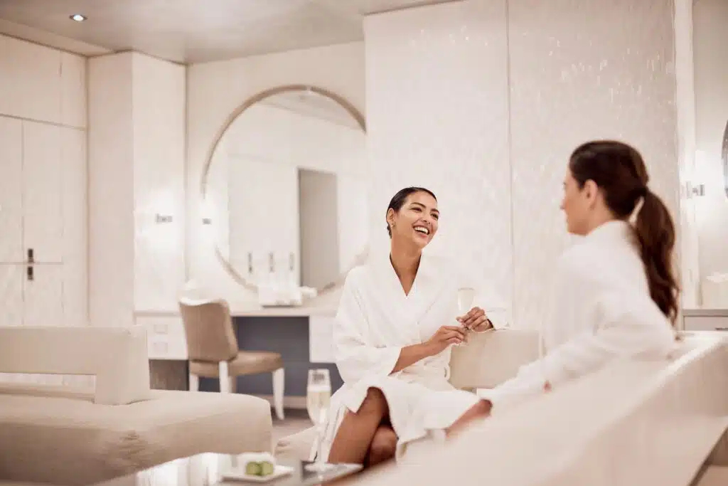 Two women chat at The Ritz-Carlton Grand Cayman Spa