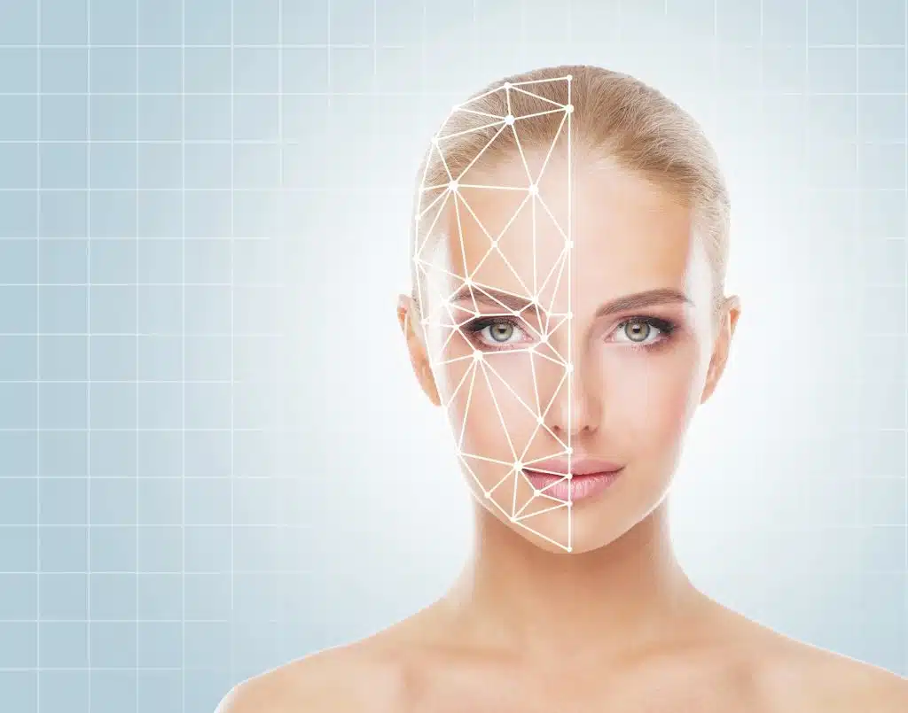Portrait of an attractive blonde woman with a scanning grid on half her face. Meant to illustrate AI-generated image.