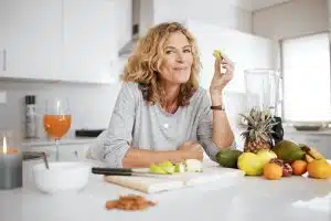 Woman enjoying a fruit salad