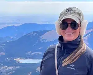 Kelly Gasspari-Fleming on a mountaintop