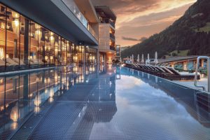 Das Edelweiss at sunset with a pool featured
