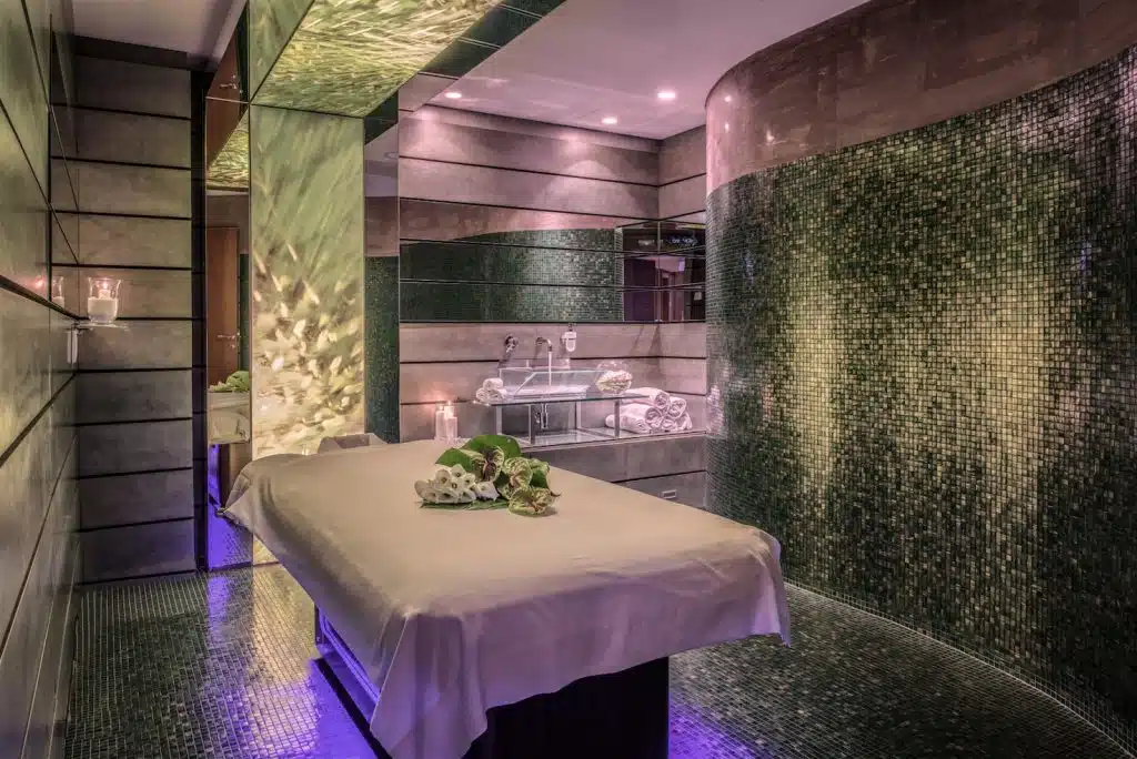 Forest treatment room at Cavalieri Grand Spa with treatment bed in the middle of the room